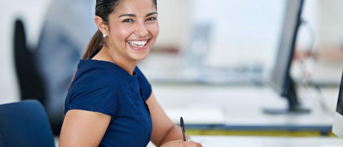 Woman Smiling In Corporate Office