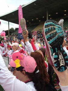 Komen Walkers Holding Up Shoes