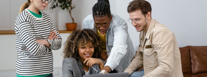 Employees discussing 2024 hiring trends